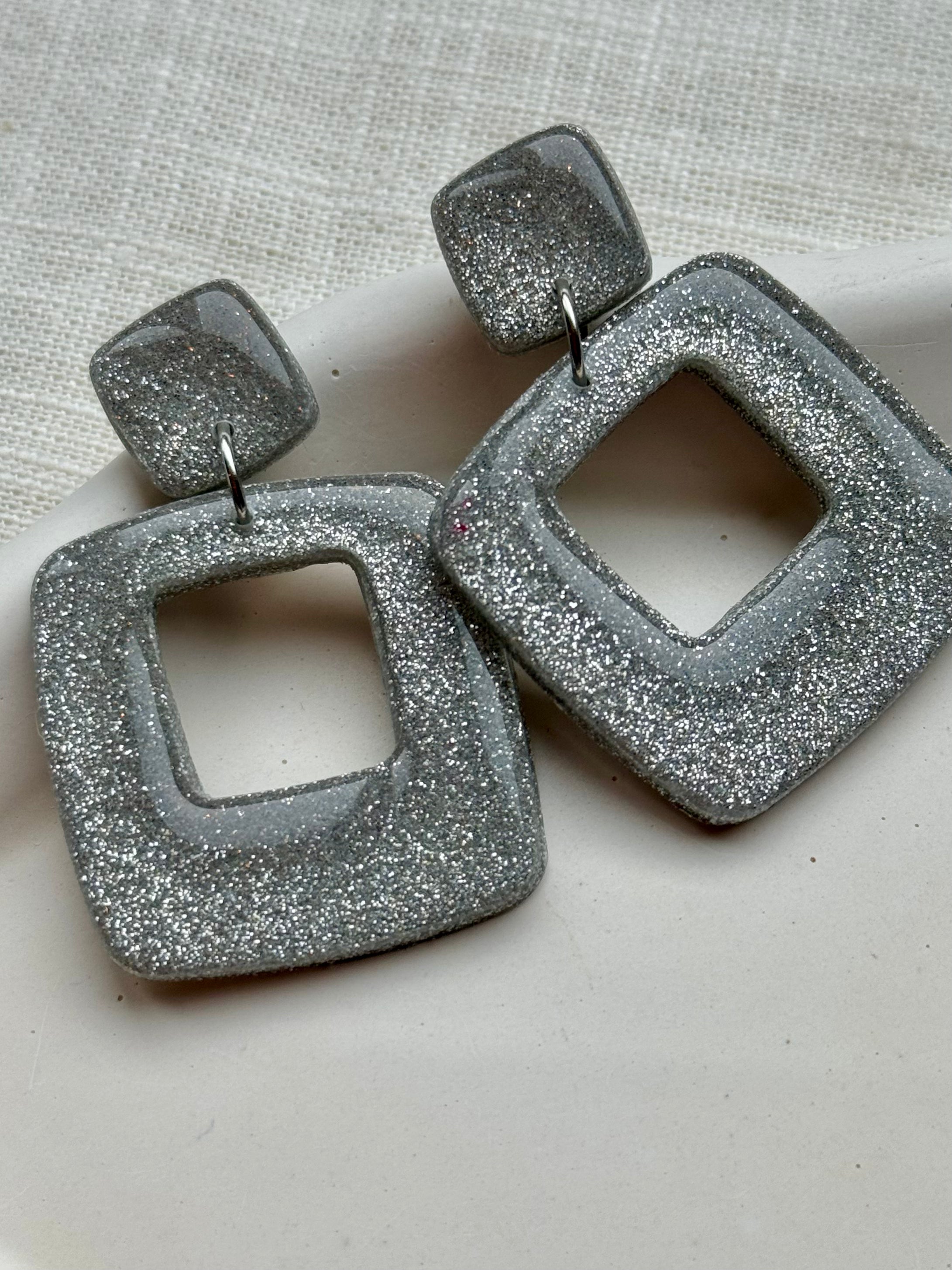 Suzie - Oorbellen glitter zilver