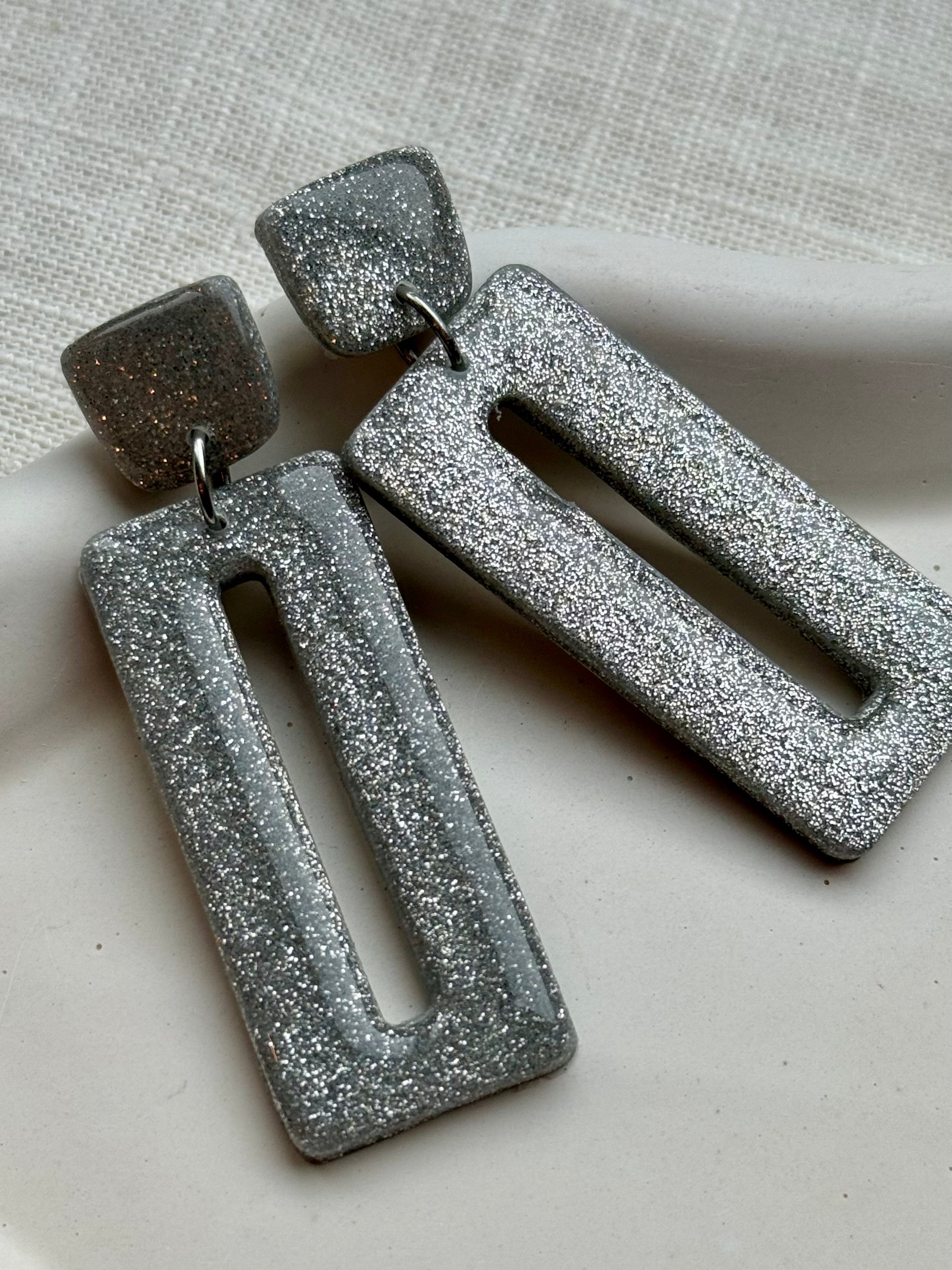 Céline - Oorbellen glitter zilver