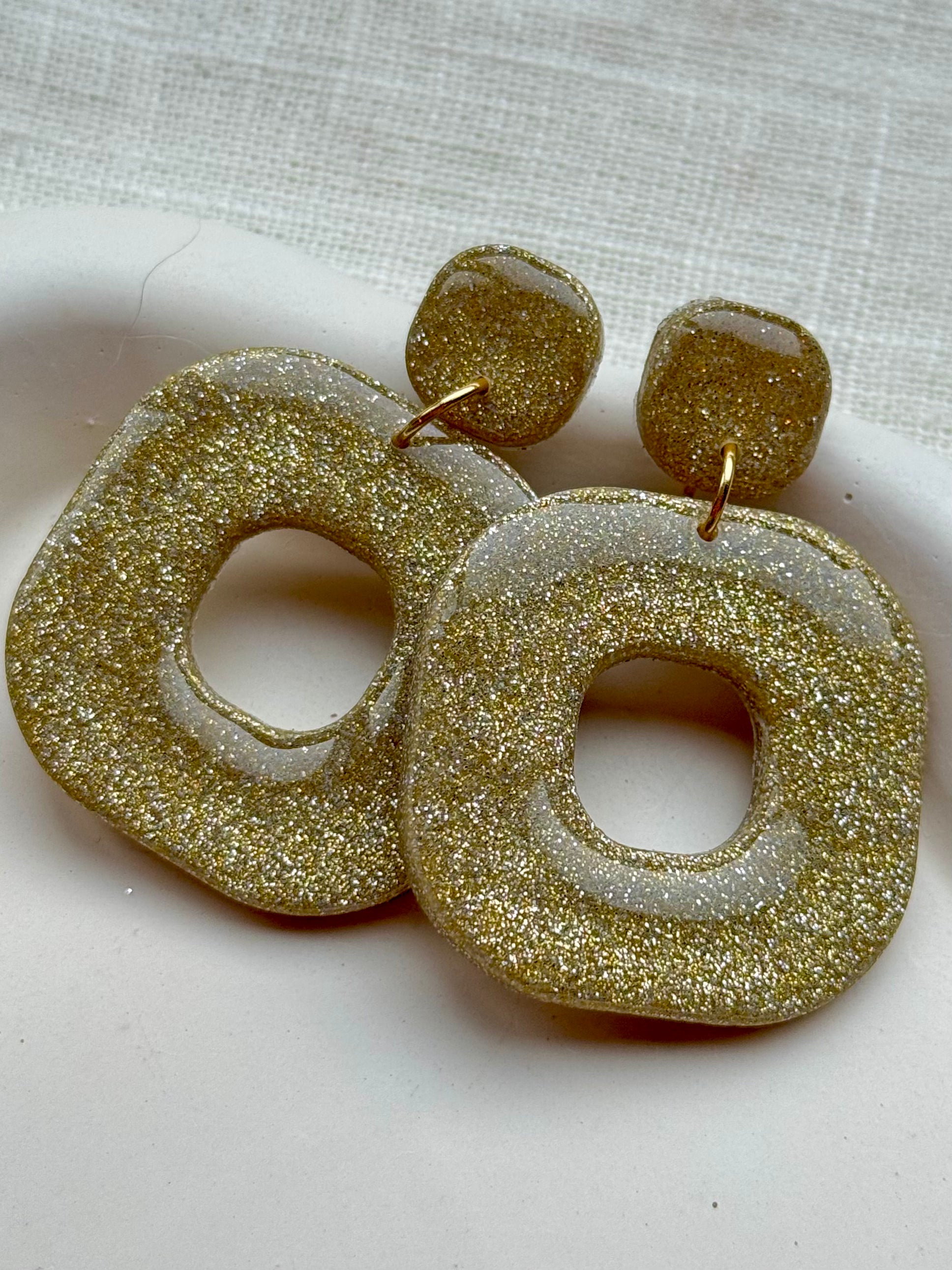 Julia - oorbellen glitter goud