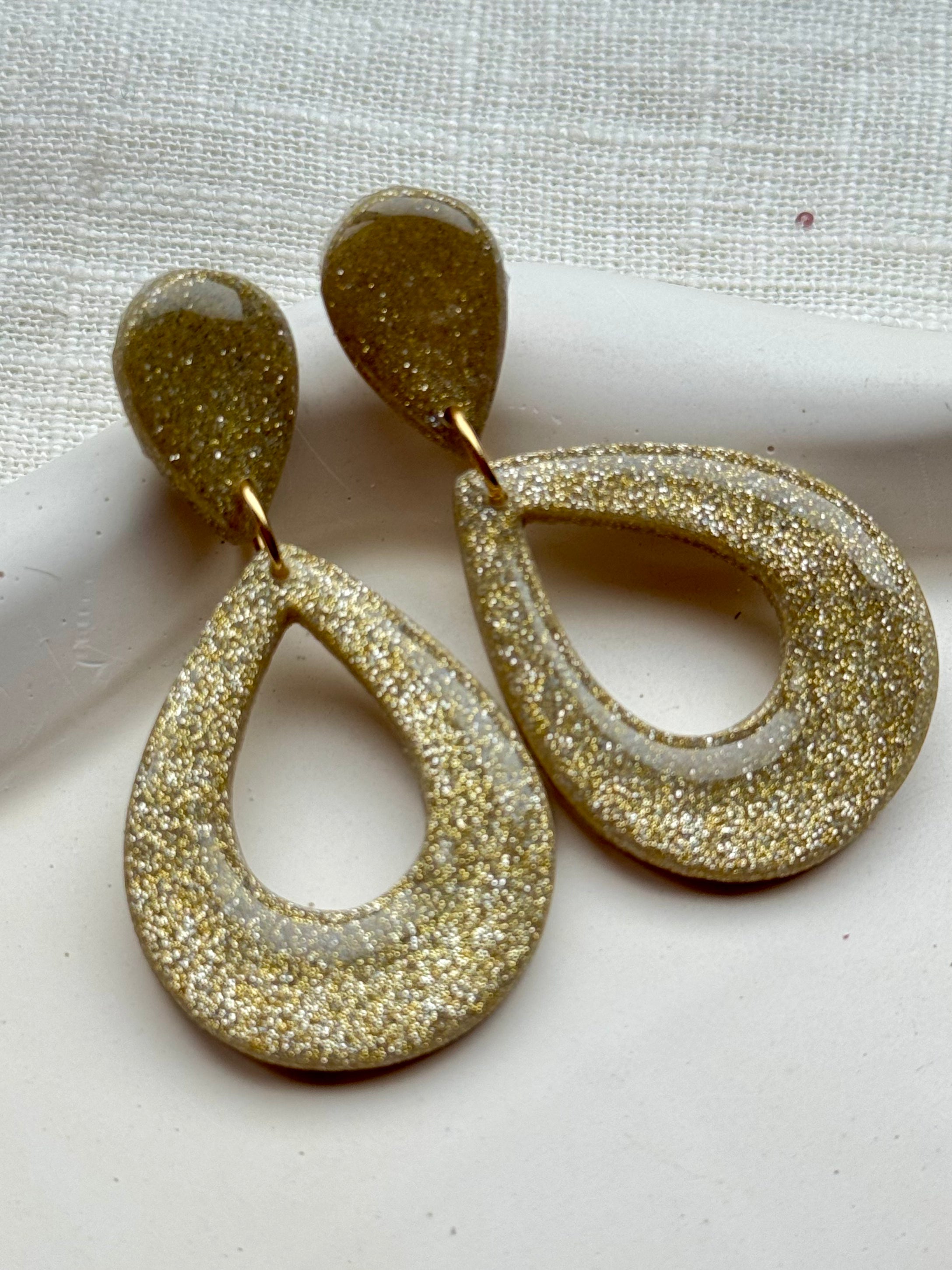 Marley - Oorbellen glitter goud
